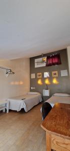 A bed or beds in a room at Casa de Huespedes Dolce Vita