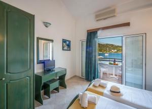 Ένα ή περισσότερα κρεβάτια σε δωμάτιο στο Villa Nelli