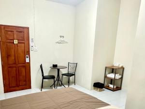 A bed or beds in a room at PD Hostel