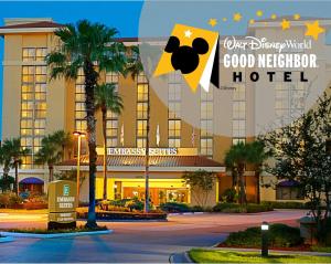 a hotel with a sign that reads good neighbor hotel at Embassy Suites by Hilton Orlando International Drive Convention Center in Orlando