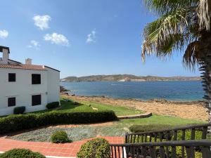 a view of the ocean from a house at BERGANTIN 109 by SOM Menorca in Fornells