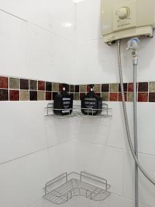 Kylpyhuone majoituspaikassa Karon Holiday Home by Bcare