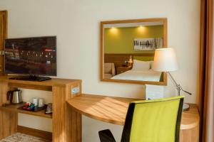 Hampton By Hilton Kalisz客房内的一张或多张床位