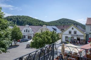 a view of a town with buildings and a street at Hotel Šipka in Štramberk