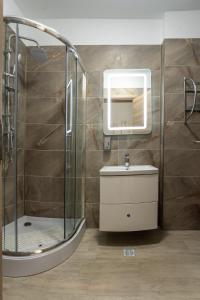 Et badeværelse på Apartament Alexia by Alz