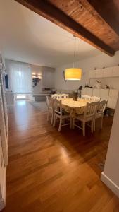 a kitchen and dining room with a table and chairs at A casa di Don Remo in Agnone