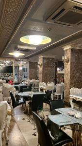 Restaurant ou autre lieu de restauration dans l'établissement Royal Mersin Otel
