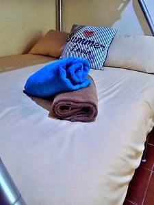 Postel nebo postele na pokoji v ubytování Shark shacks