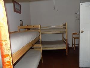 Postel nebo postele na pokoji v ubytování Shark shacks