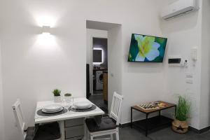 TV a/nebo společenská místnost v ubytování Bella 'Mbriana Home + 37 fotografií