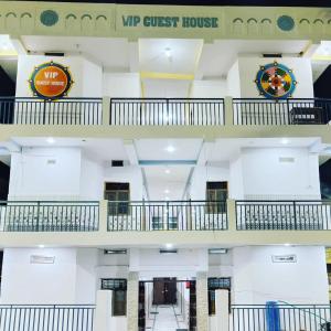 a view of a building with two balconies at VIP Guest House Bodhgaya in Gaya