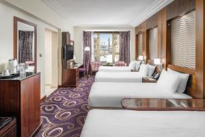 Postel nebo postele na pokoji v ubytování Elaf Kinda Hotel