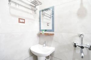 Koupelna v ubytování HOTEL SUSHREE INTERNATIONAL + 22 fotografií