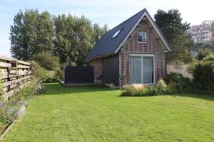 Vonkajšia záhrada v ubytovaní Jolie Maison en Bord de Mer à Pourville