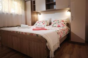 Postel nebo postele na pokoji v ubytování Apartments Faris