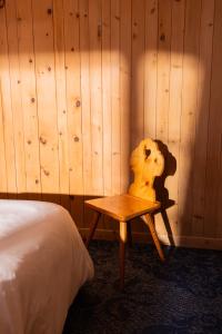 Ένα ή περισσότερα κρεβάτια σε δωμάτιο στο Hotel Chesa Rosatsch - Home of Food