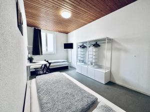 Postel nebo postele na pokoji v ubytování Monteurzimmer - Worker's accommodation - ZIMMERzuVERMIETEN in Balsthal Solothurn