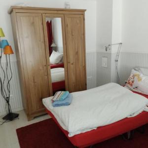 Cama ou camas em um quarto em Apartment-Nordstern-charmant-und-geraeumig