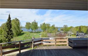 a view from the deck of a house at Lovely Home In Brkop With Kitchen in Brejning