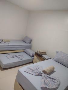 Ένα ή περισσότερα κρεβάτια σε δωμάτιο στο Lindo apto praia do bessa
