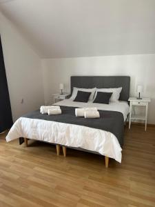 Postel nebo postele na pokoji v ubytování Apartman Magnolia