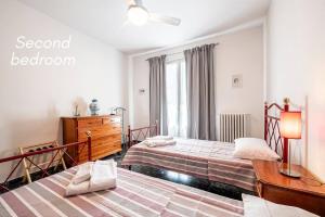 Postel nebo postele na pokoji v ubytování Easy Florence Scandicci