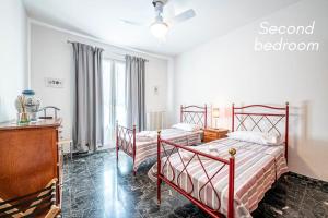 Postel nebo postele na pokoji v ubytování Easy Florence Scandicci