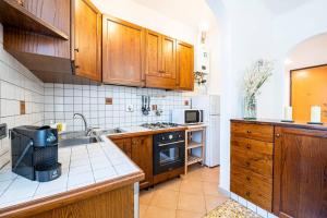 Kuchyň nebo kuchyňský kout v ubytování Easy Florence Scandicci