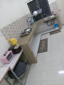 Gambar di galeri bagi NORIS GUEST HOUSE 2 di Gambang