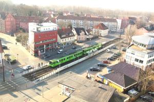 an aerial view of a city with a train station at Private Rooms in Hannover
