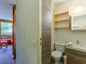 a bathroom with a toilet and a sink at Studio Val-d'Isère, 1 pièce, 4 personnes - FR-1-694-209 in Val-d'Isère