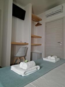 Postel nebo postele na pokoji v ubytování B&B Barù