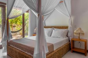 Postel nebo postele na pokoji v ubytování Vila Florir