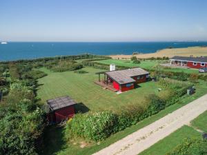 an overhead view of a house on a farm at Magnificent house with splendid view to the sea in Fåborg