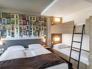 Postel nebo postele na pokoji v ubytování B&B Hotel Lübeck