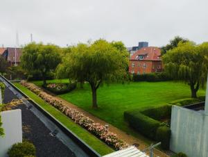 a view of a park with trees and bushes at (Id 039) Rørkjærsgade 12 dor 209 in Esbjerg