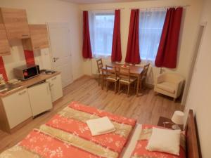 Postel nebo postele na pokoji v ubytování Dueta Apartment