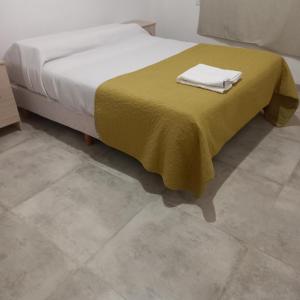 Een bed of bedden in een kamer bij Cabañas Plottier-Neuquén