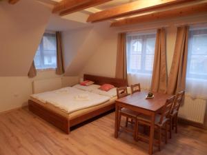 Postel nebo postele na pokoji v ubytování Dueta Apartment