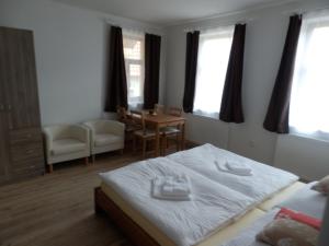 Postel nebo postele na pokoji v ubytování Dueta Apartment