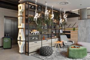 Kuchyňa alebo kuchynka v ubytovaní Moxy Vienna City East
