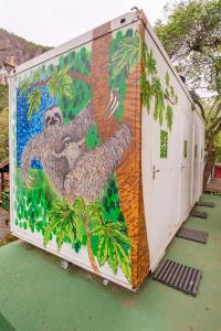 a mural of a monkey on the side of a building at Auá Hostel in Petrópolis
