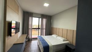 Postel nebo postele na pokoji v ubytování Hotel Colibri Viçosa - Próximo a UFV