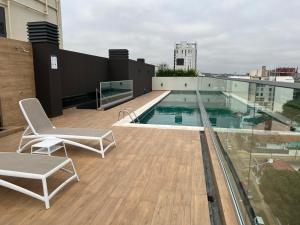 Apartamento con pileta! Ed Hassler! #8 Mariale游泳池或附近泳池