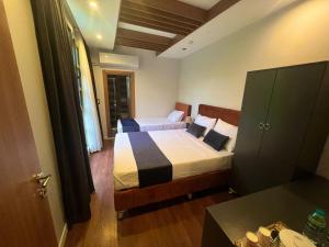 a bedroom with two beds in a room at Beta Hotel Avcılar in Avcılar