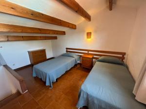 Postel nebo postele na pokoji v ubytování MISTRAL 10 by SOM Menorca + 18 fotografií