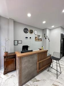 an office with a reception desk and a chair at Marista Pansiyon in Istanbul