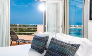 Postel nebo postele na pokoji v ubytování Hotel Tahiti