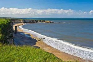 a view of a beach with the ocean at Inviting 3-Bed House in Sunderland WiFi Parking in Sunderland