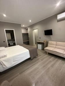 TV a/nebo společenská místnost v ubytování B&b Sanem Luxury rooms